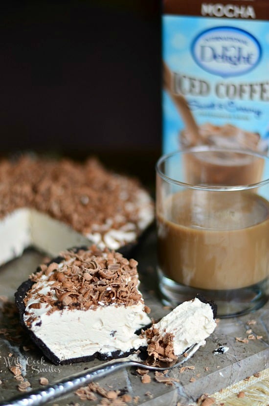 Mocha Ice Cream Pie, a cream pie topped with shaved milk chocolate with some on a fork 