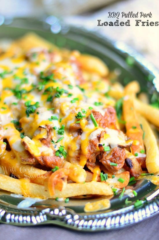 Pulled BBQ Pork Loaded Fries on a silver platter 