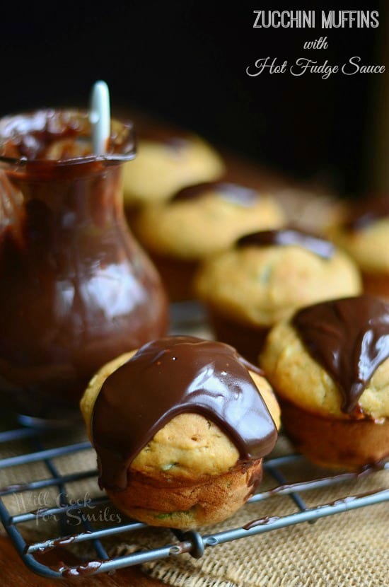 Zucchini Muffins with Hot Fudge Sauce on a cooling rack 