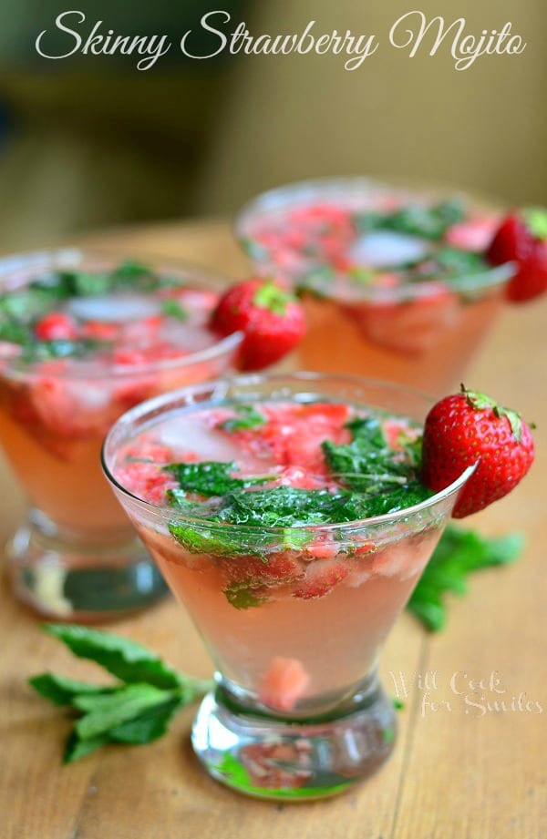Skinny Strawberry Mojito in a glass with a strawberry as garnish 