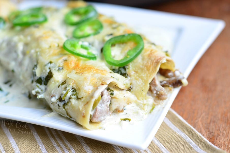 Steak Enchiladas with Jalapeño Cilantro Cream Sauce from willcookforsmiles.com