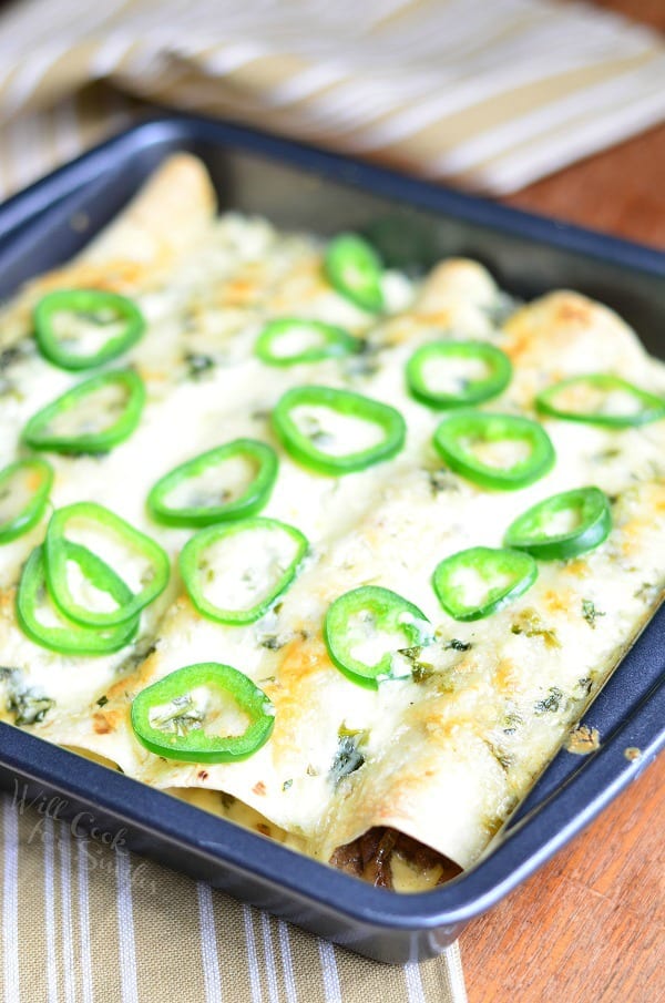 Steak Enchiladas with Jalapeño Cilantro Cream Sauce | from willcookforsmiles.com