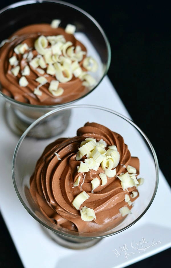 Chocolate Mousse Recipe in glasses with white chocolate shavings on a white plate 