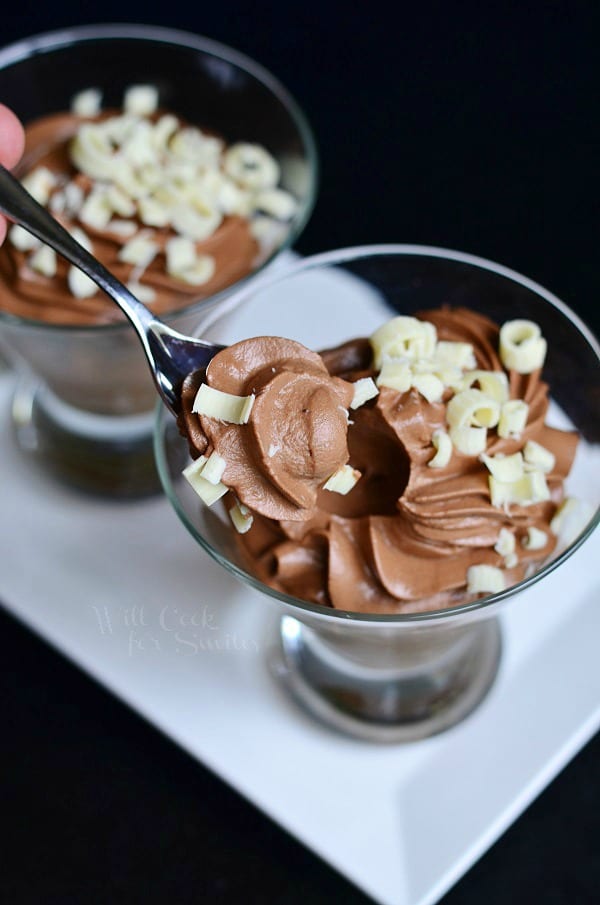 Chocolate Mousse Recipe in glasses with white chocolate shavings on a white plate 