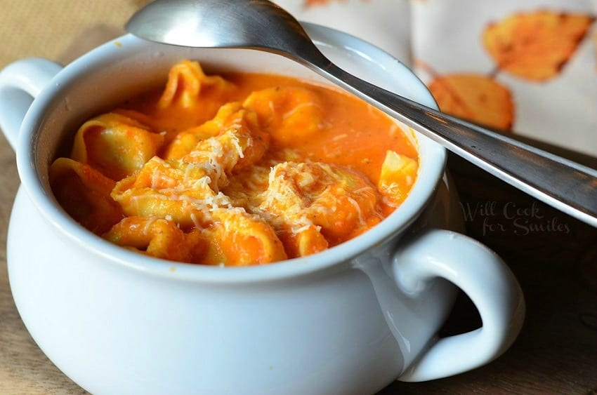 Roasted Bell Pepper Tortellini Soup in a white soup bowl 