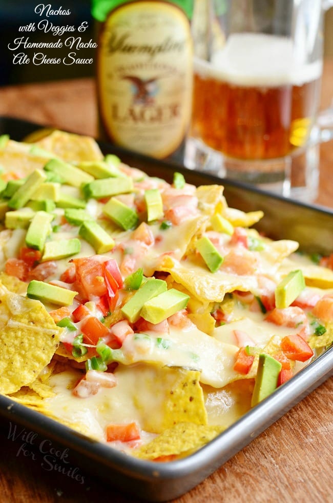 Amazing Nachos with Veggies and Homemade Nacho Ale Cheese Sauce. Easy and amazing snack to serve at your next football party! from willcookforsmiles.com