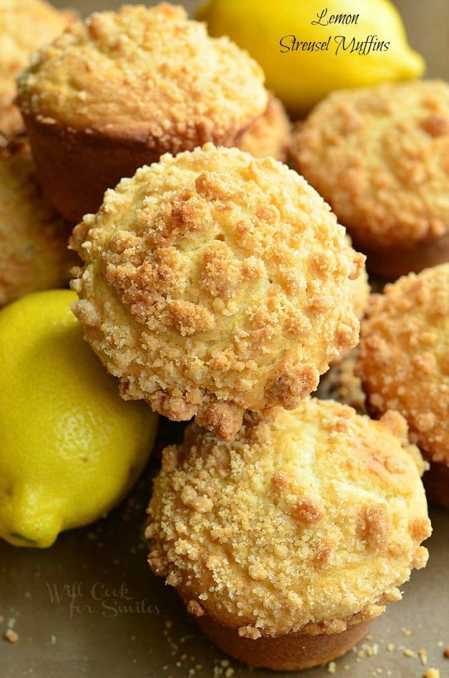 Lemon Streusel Muffins with lemons as garnish around it 