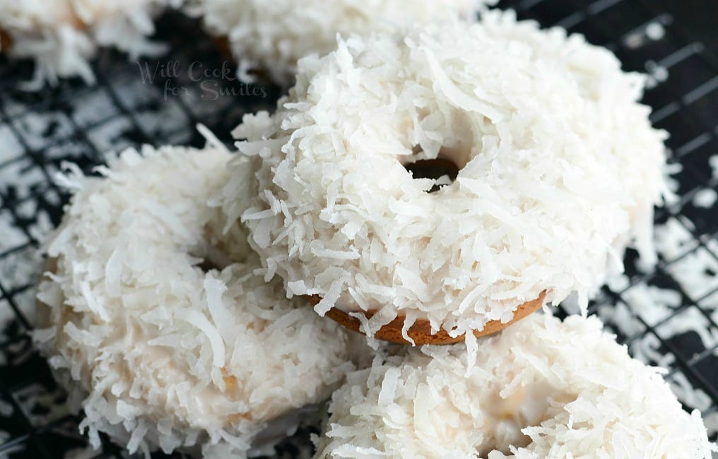 Coconut Cake Donuts on a cooling rack 