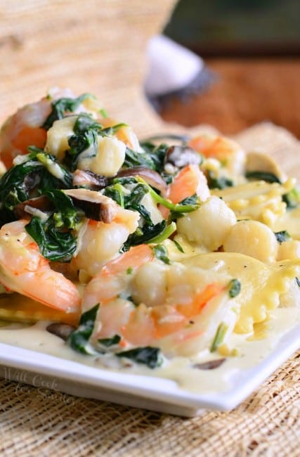 Ravioli with Seafood, Spinach and Mushrooms in Garlic Cream Sauce ...