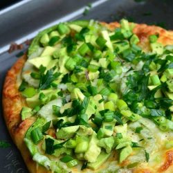 Green Naan Pizza on a baking pan