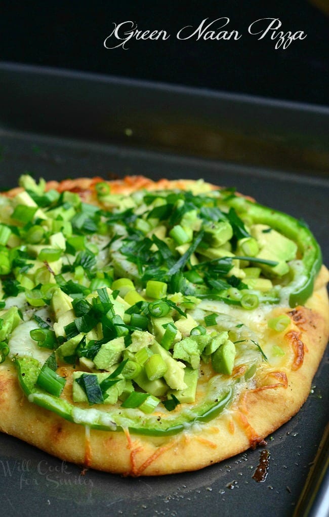 Green Naan Pizza with avocado, green peppers and green onions on top. 