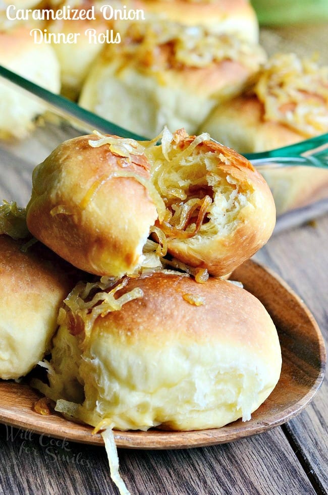 Caramelized Onion Dinner Rolls with one cut in half and onions inside 