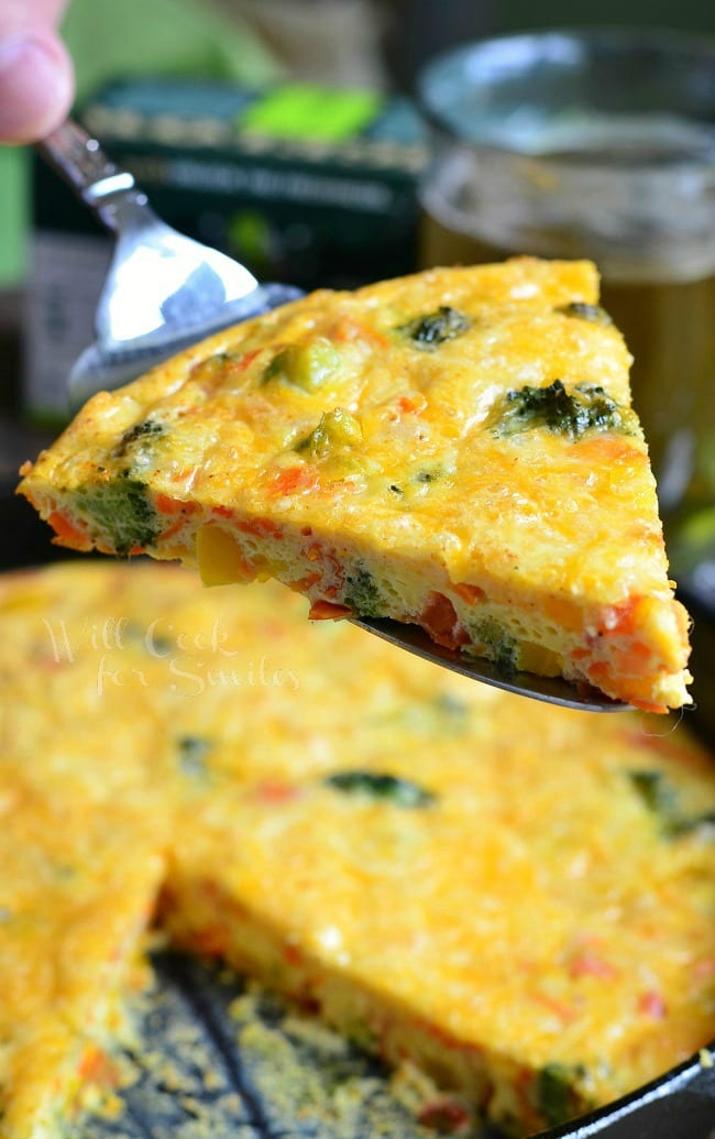 Vegetable and Cheese Breakfast Bake being lifted by pie spatula 