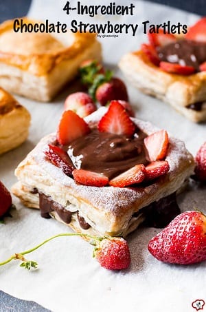 Chocolate tart with chocolate and strawberries on top 