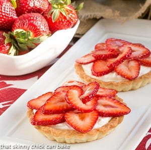 Strawberry tarts with fresh strawberries on top 