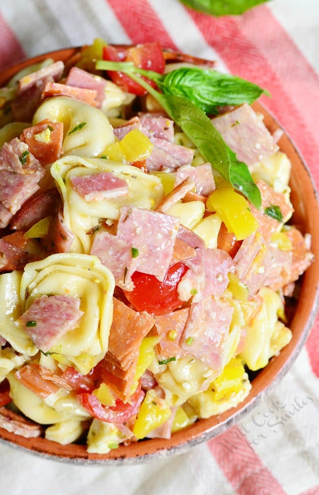 Italian Tortellini Salad with meats and tomato in a bowl 