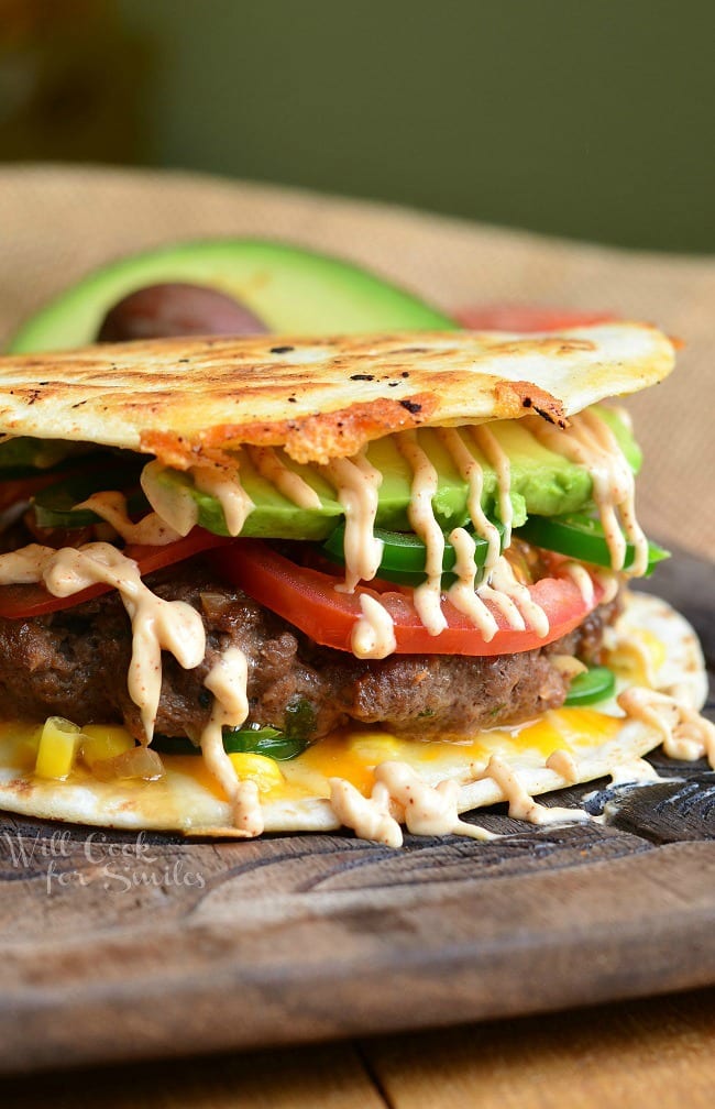 Quesadilla Burger with avocado tomato and fried tortilla as the bun 