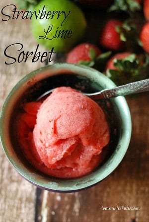 top view of Strawberry sorbet in a bowl with a spoon 