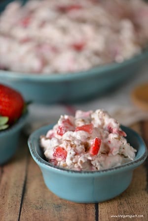 strawberry salad with marshmallows in a small blue bowl 