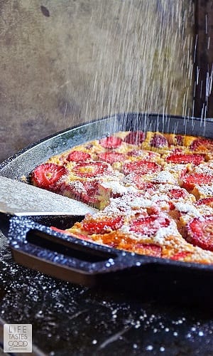 strawberry clafoutis in a cast iron pan 