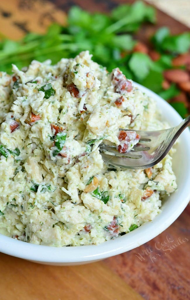 Italian Three Cheese Chicken Salad in a bowl with a fork 