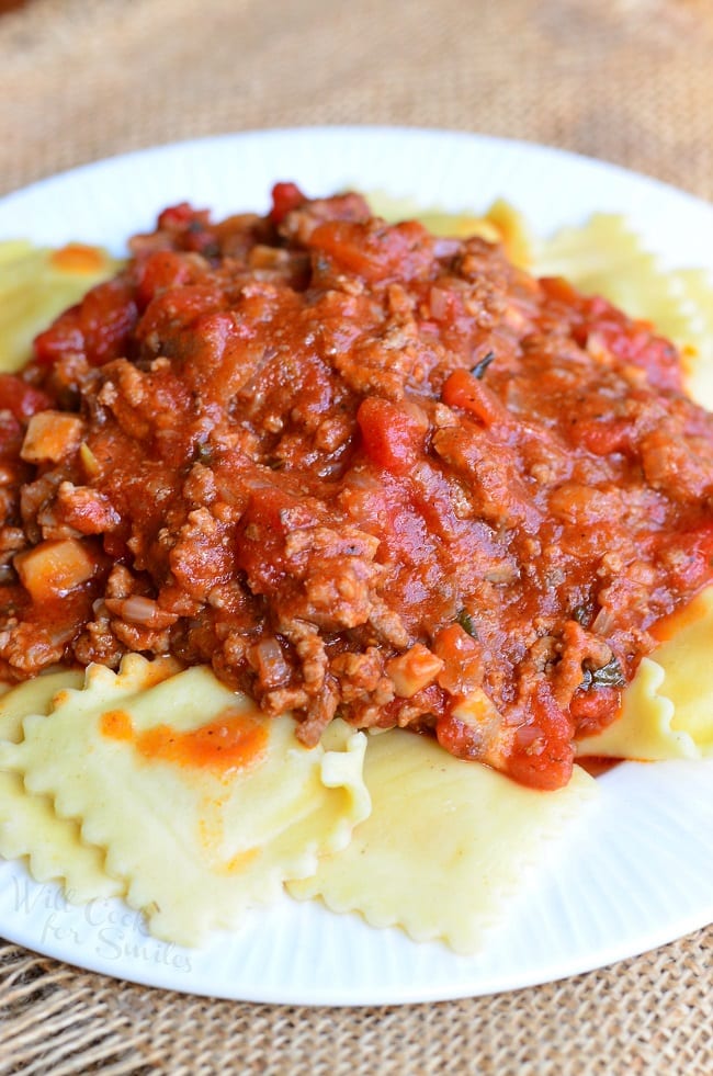 Ravioli with Meat Sauce with on a white plate  