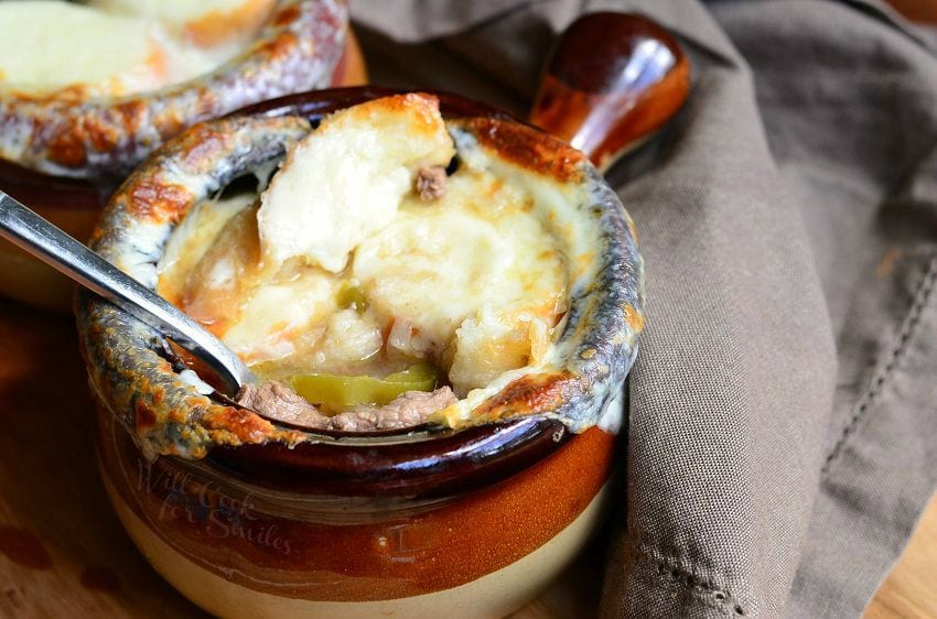 Philly Cheese Steak Soup bowl with a spoon inside it 