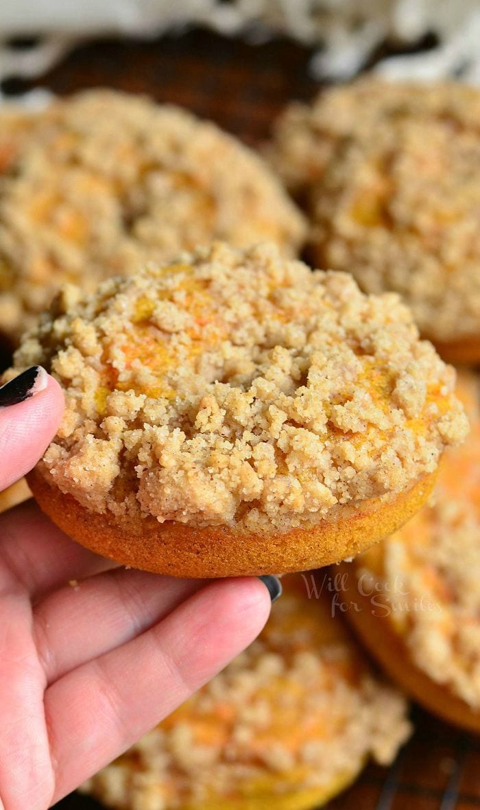 holding a pumpkin Carrot Cake Streusel Donut