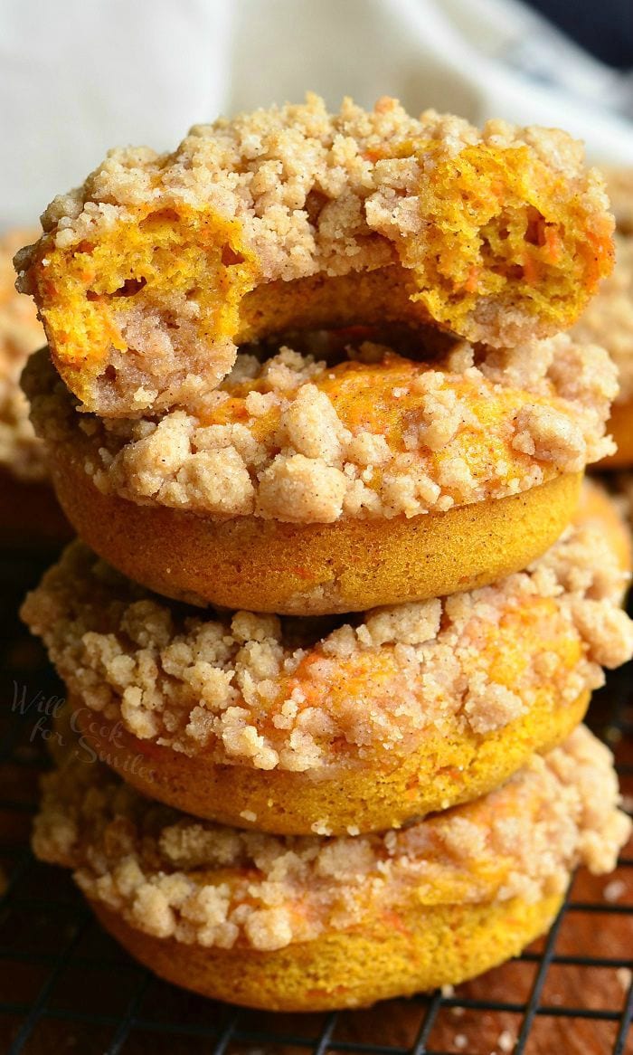 Pumpkin Carrot Cake Streusel Donuts stacked up 