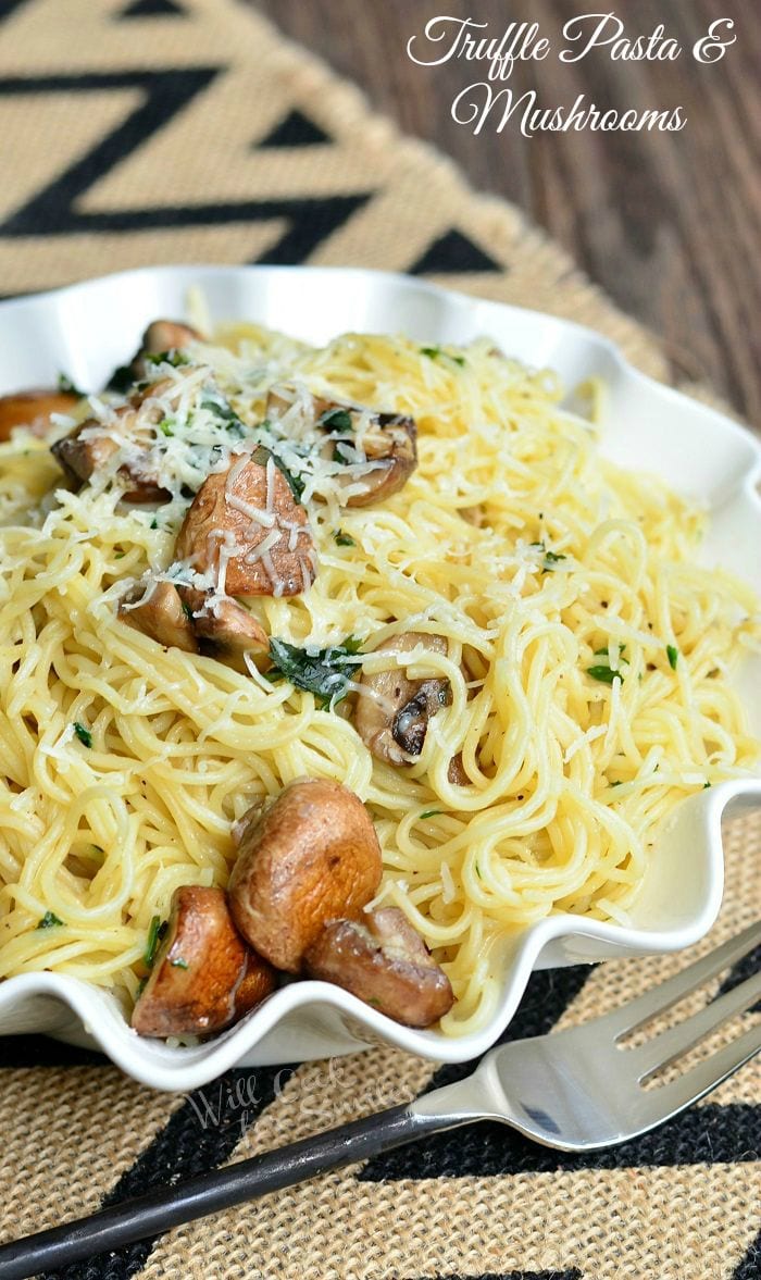 Truffle Pasta and Mushrooms in a white serving bowl 
