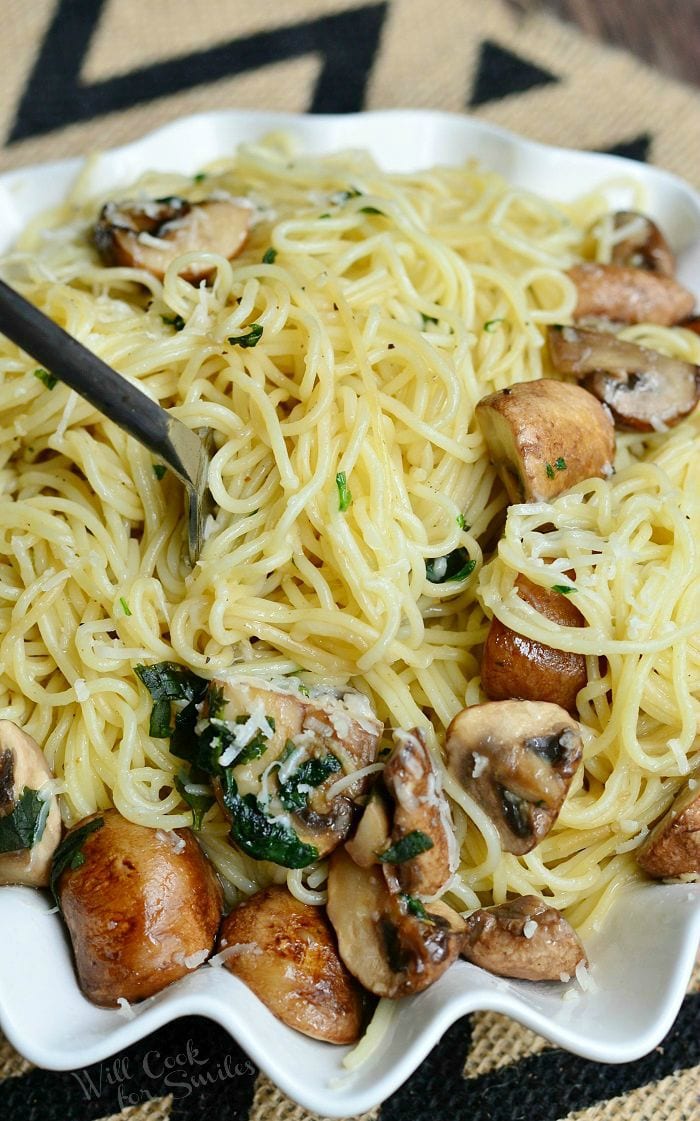 Truffle Pasta and Mushrooms in a white serving bowl 