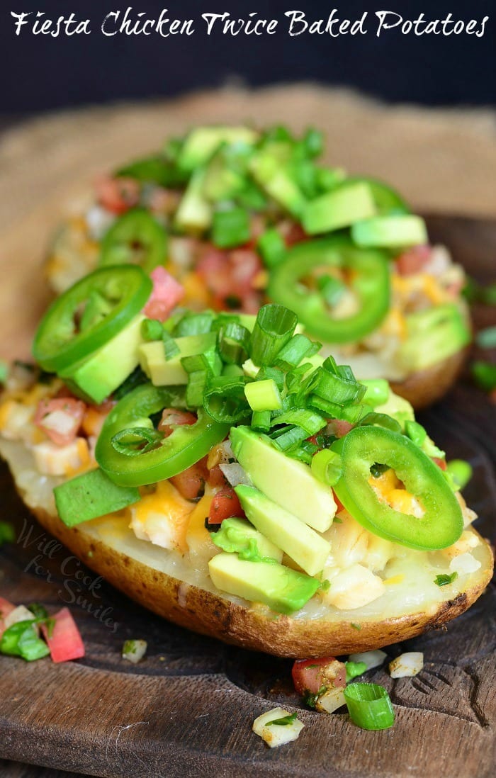 Twice Baked Potatoes with cheese, green onions, jalapenos, and avocado 