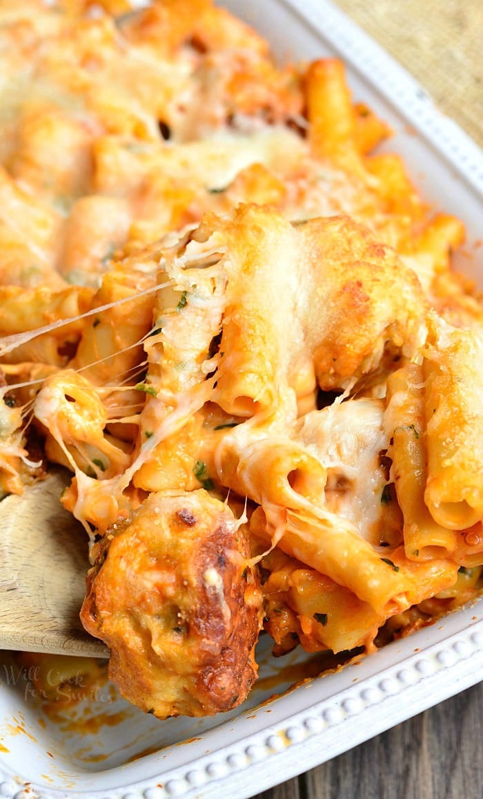 Chicken Meatball Baked Ziti in a white casserole dish 