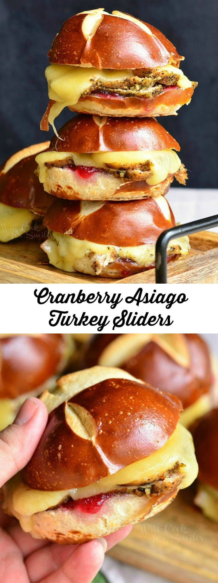 Cranberry Asiago Turkey Sliders on a pretzel bun with cheese, turkey, and cranberry sauce stacked on a cutting board 