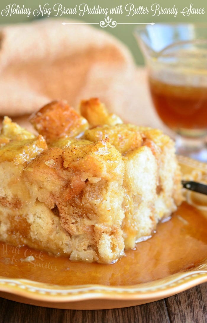 Nog Bread Pudding with Butter Brandy Sauce on a yellow plate 