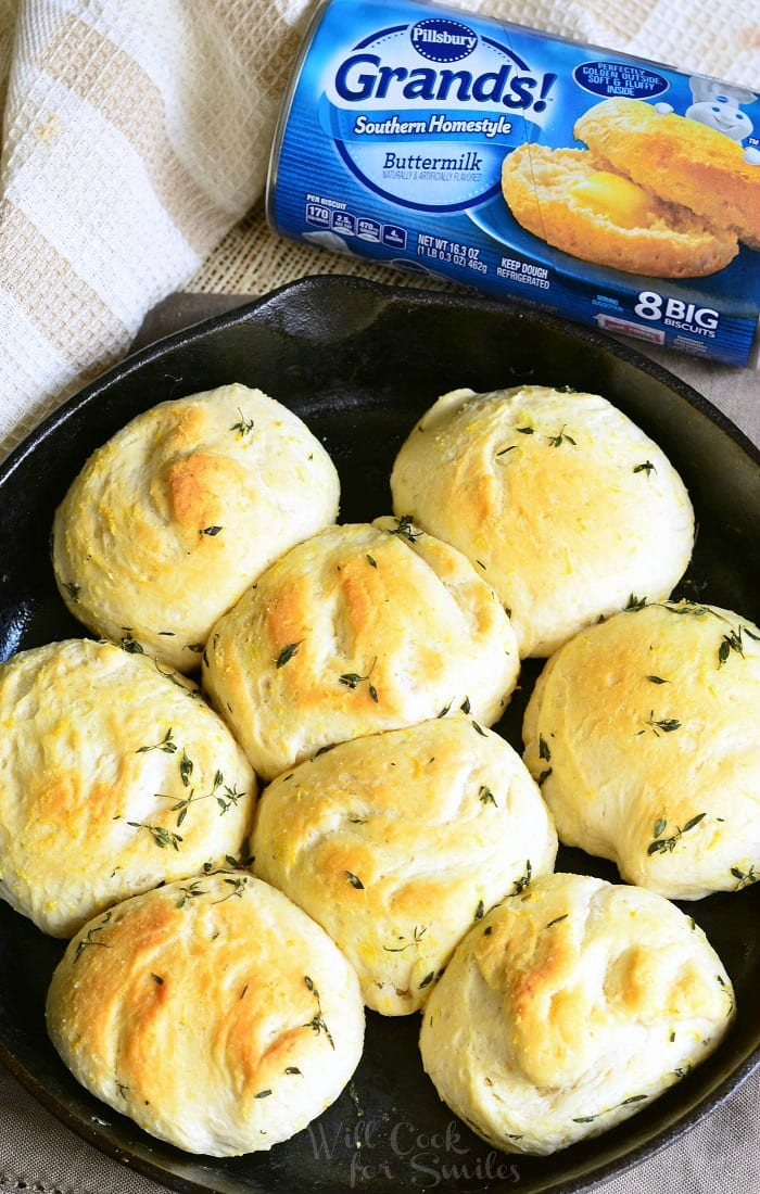 can of grands biscuits and Thyme Skillet Biscuits in a cast iron pan 
