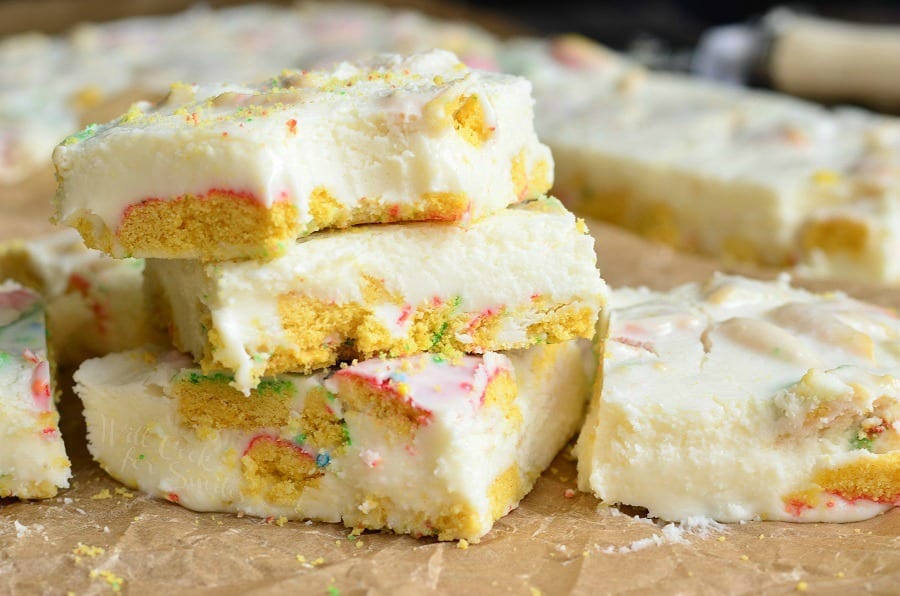 cookie fudge stacked up on parchment paper 