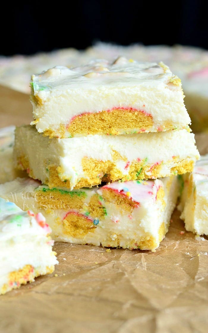 Sugar Cookie Fudge stacked up on parchment paper 