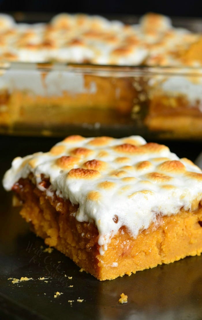 sweet potato casserole slice with marshmallow topping on a table 