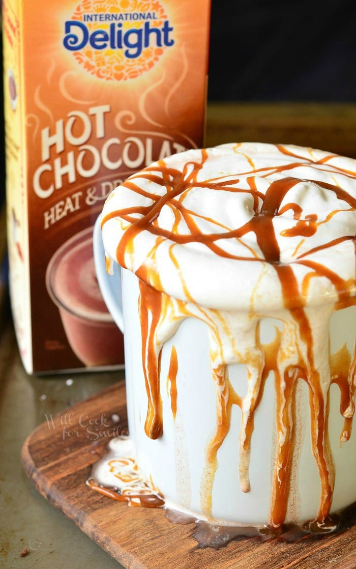 Caramel Marshmallow Hot Chocolate on a white mug with marshmallow and caramel on top 