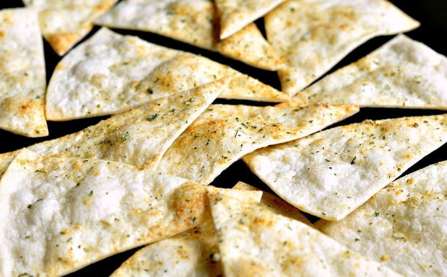 Homemade Baked Cool Ranch Tortilla Chips on baking sheet 