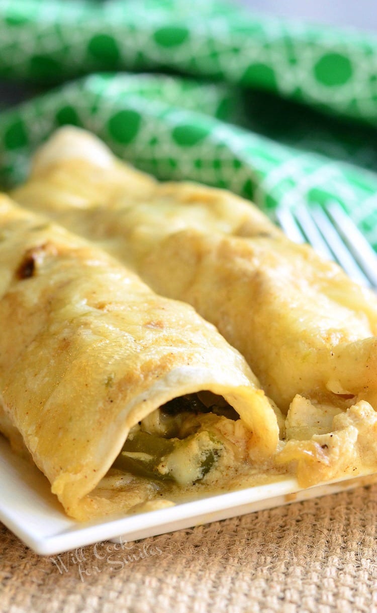 Roasted Poblano and Chicken Enchiladas on a white plate 