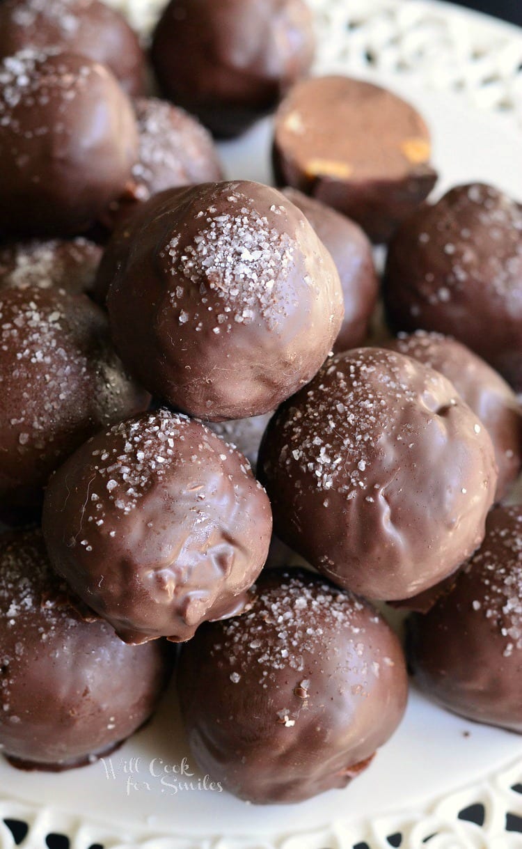 Salted Almond Fudge Truffles stacked onto a platter 