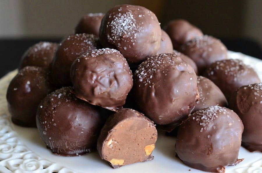 Salted Almond Fudge Truffles stacked on a platter 