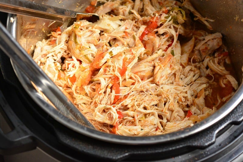 cooked and shredded chicken and vegetables in instant pot