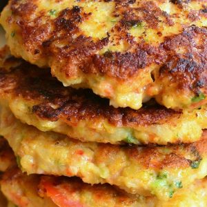 5 avocado shrimp burgers stacked as viewed close up