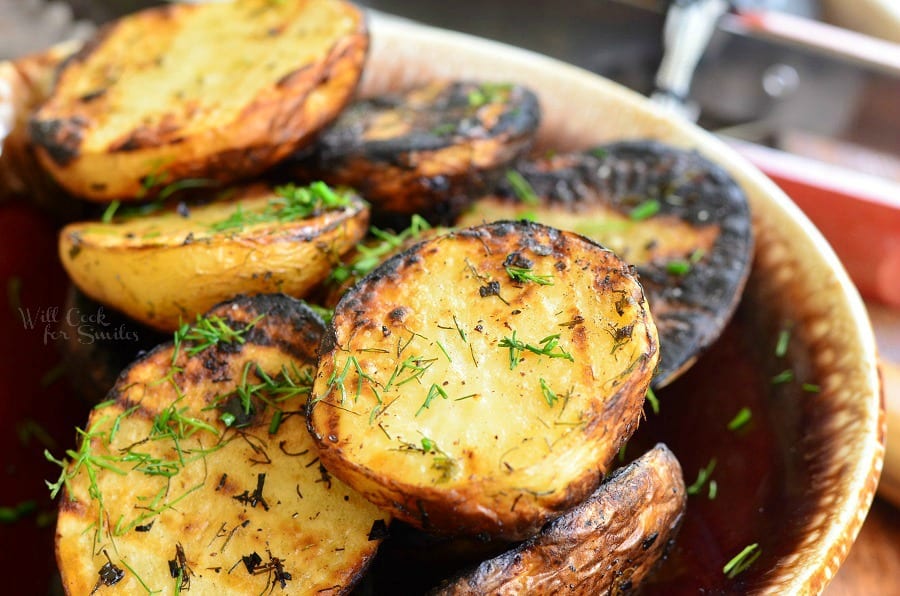 Herbed Grilled Potatoes in a brown bowl 