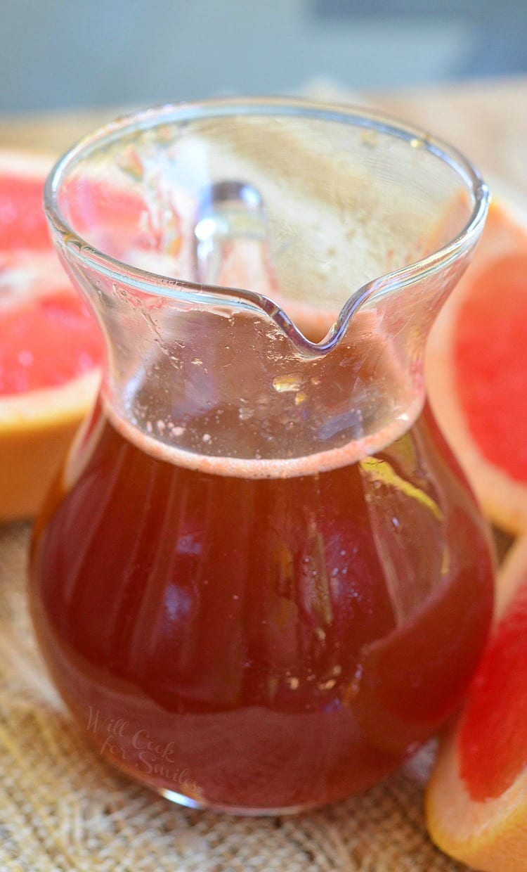 Homemade Grapefruit Syrup in a glass container