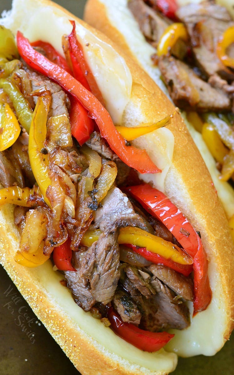 Fajita Philly Steak Sandwich with steak, red and yellow bell peppers, with onions on a hoagie roll 