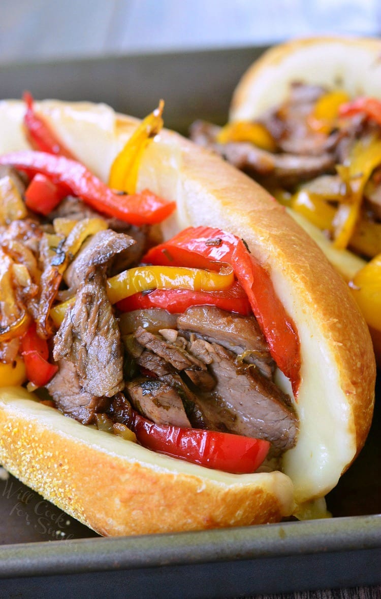 Fajita Philly Steak Sandwich with steak, red and yellow bell peppers, with onions on a hoagie roll 